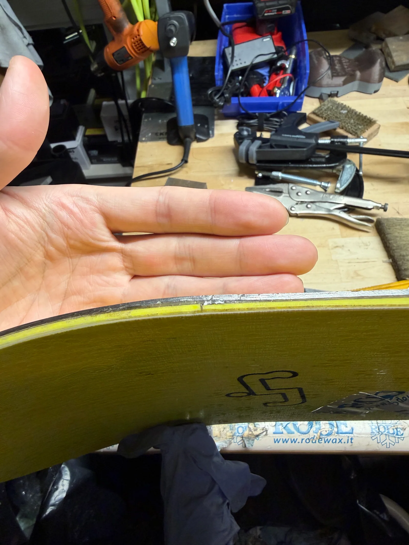 Snowboard edge and layers after delamination repair