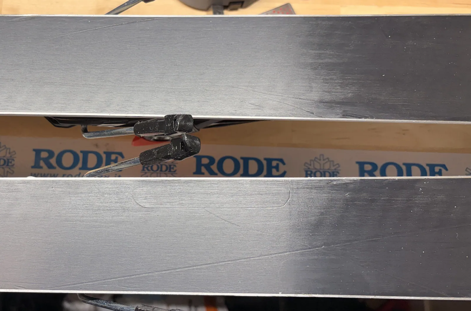 Snowboard base after core-shot repair and finishing